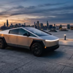 Stainless steel Tesla Cybertruck parked on a concrete plaza at dusk with a city skyline in the background.