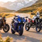 Four Yamaha motorcycles including a blue R1 sports bike parked on a scenic mountain road at sunset.